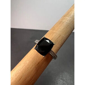 Black spinel in stainless steel ring size 9